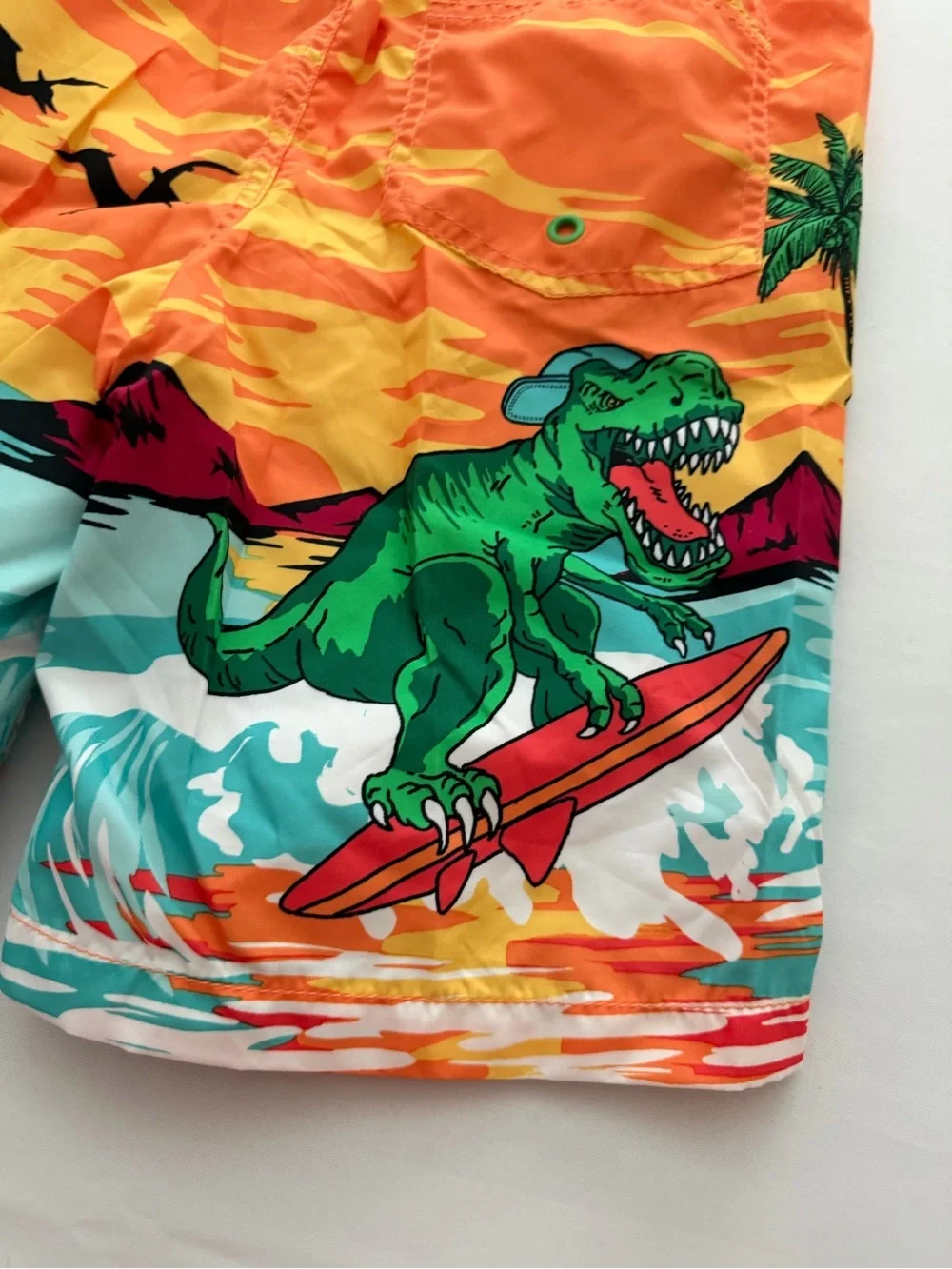 (NWT) Old Navy Boy’s Dinosaur 🦖 Swim Trunks in Orange/Multi, Large (10/12)